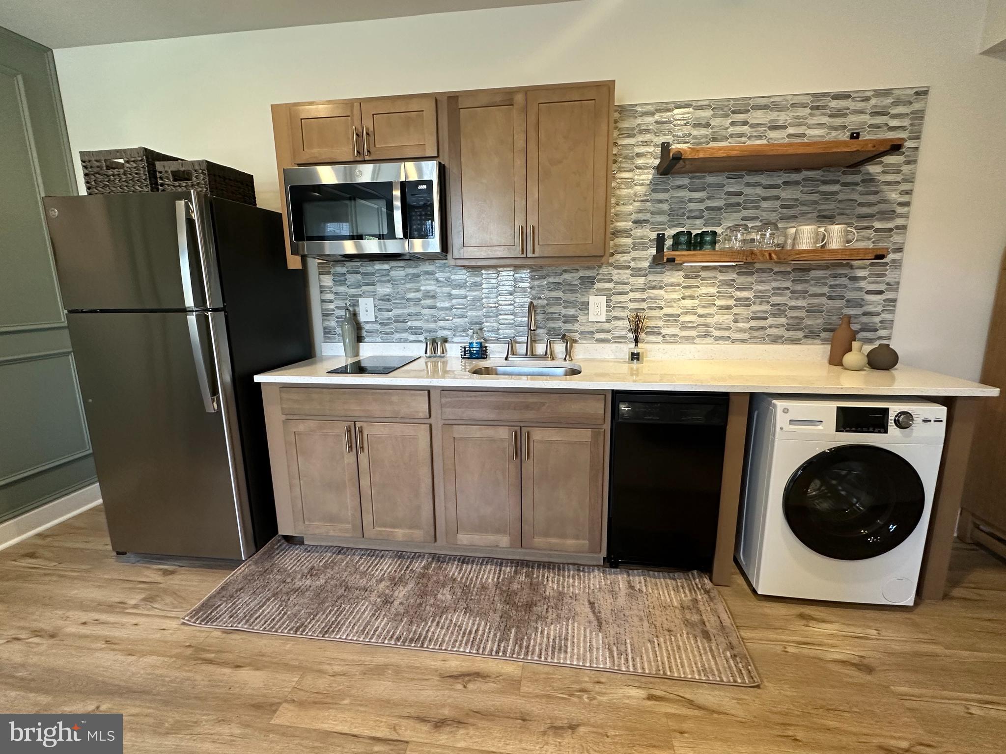 1425 Two Rivers Boulevard Odenton, MD 21113 - Photo 6 of 11 a kitchen with stainless steel appliances granite countertop a refrigerator a stove a sink and a cabinets