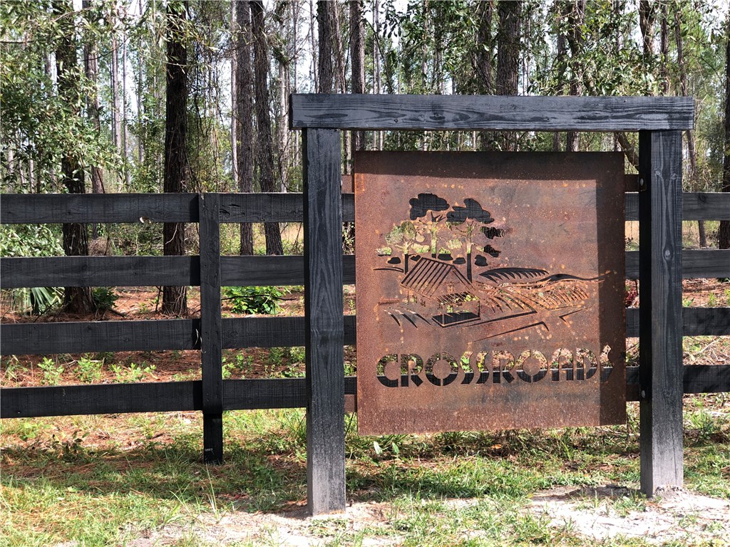 Lot 10 County Road Hilliard, FL 32046 - Photo 1 of 16 a front view of a house with a yard