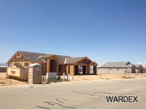0 Long Mountain Road Kingman, AZ 86401 - Photo 7 of 16 a front view of a house with a yard