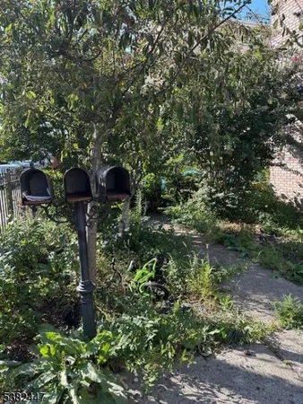 a couple of table and chairs in a yard