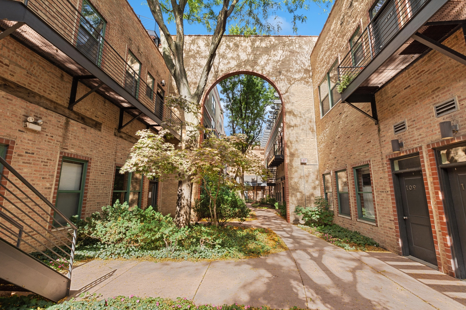 22 North Morgan Street, Unit 202 Chicago, IL 60607 - Photo 1 of 29 a view of a building with a garden