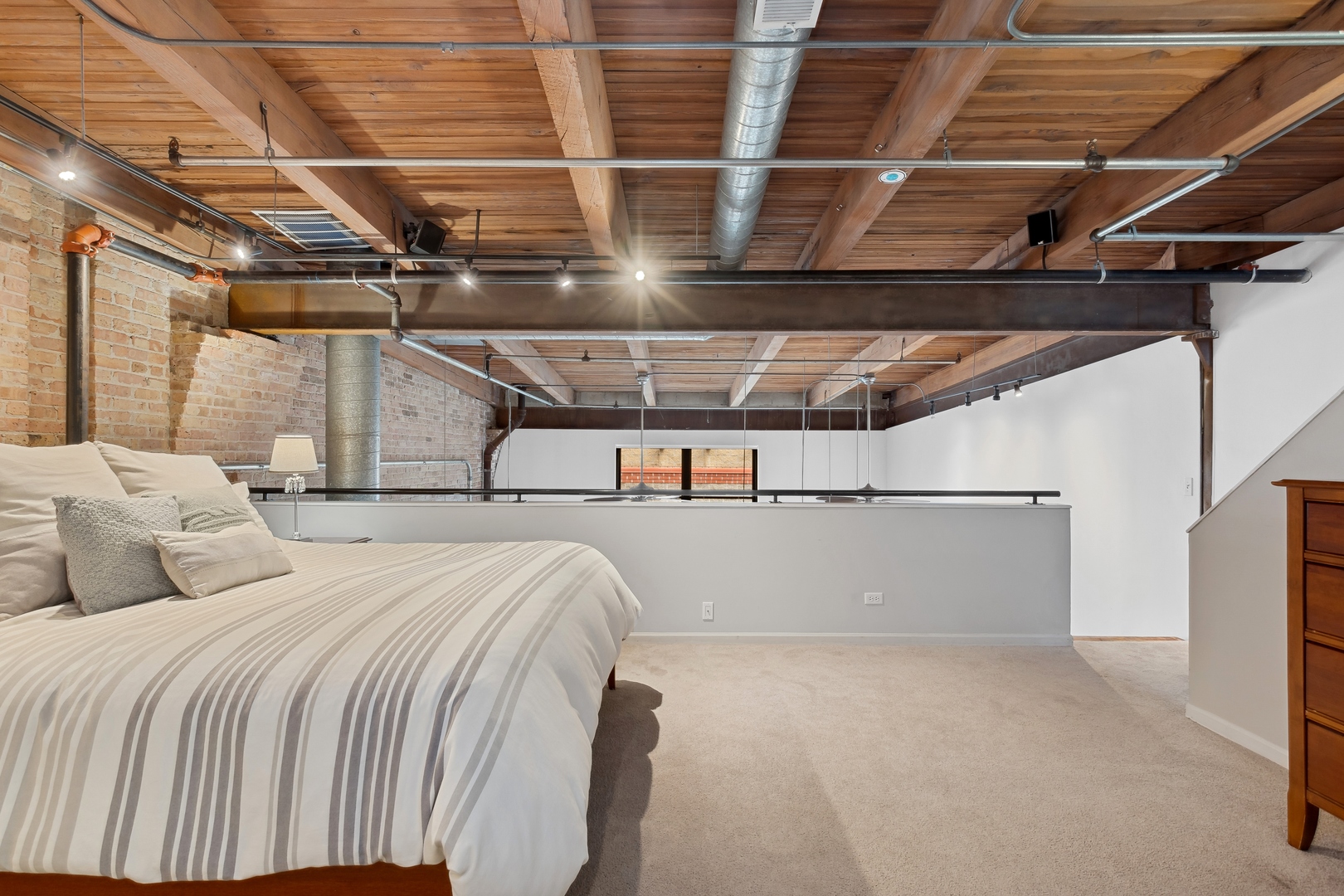 22 North Morgan Street, Unit 202 Chicago, IL 60607 - Photo 13 of 29 a bed room with a bed
