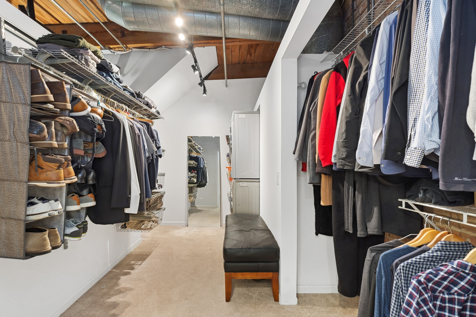 22 North Morgan Street, Unit 202 Chicago, IL 60607 - Photo 15 of 29 a view of walk in closet with clothes and shoes