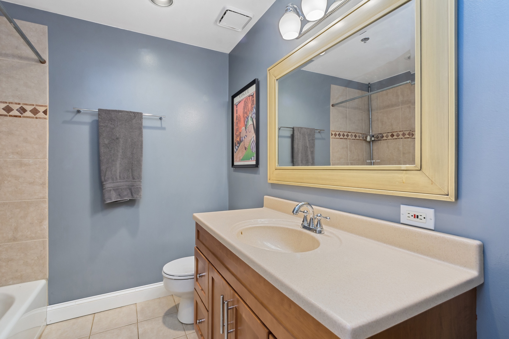 22 North Morgan Street, Unit 202 Chicago, IL 60607 - Photo 20 of 29 a bathroom with a sink vanity mirror and toilet