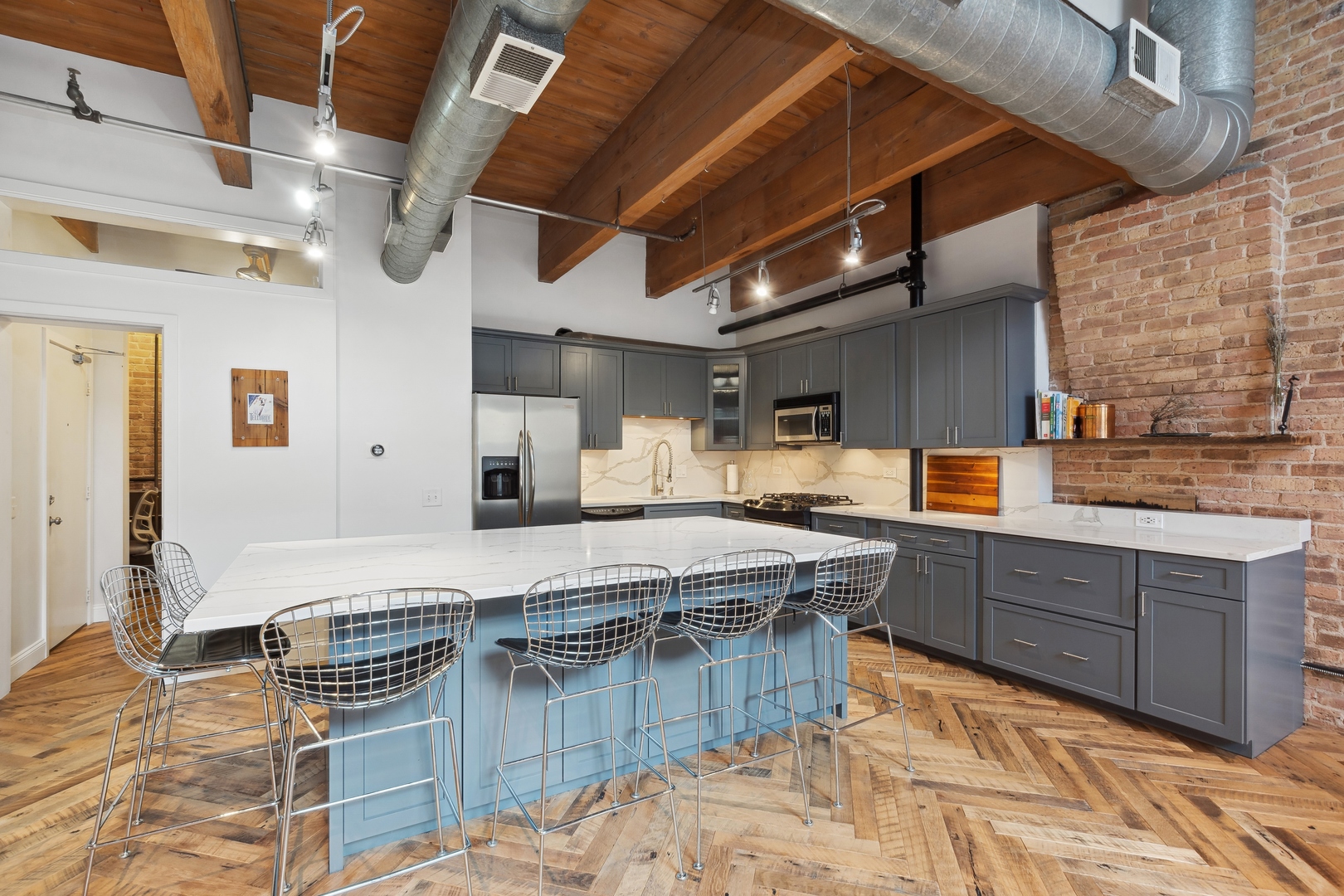 22 North Morgan Street, Unit 202 Chicago, IL 60607 - Photo 8 of 29 a kitchen with counter top space and appliances