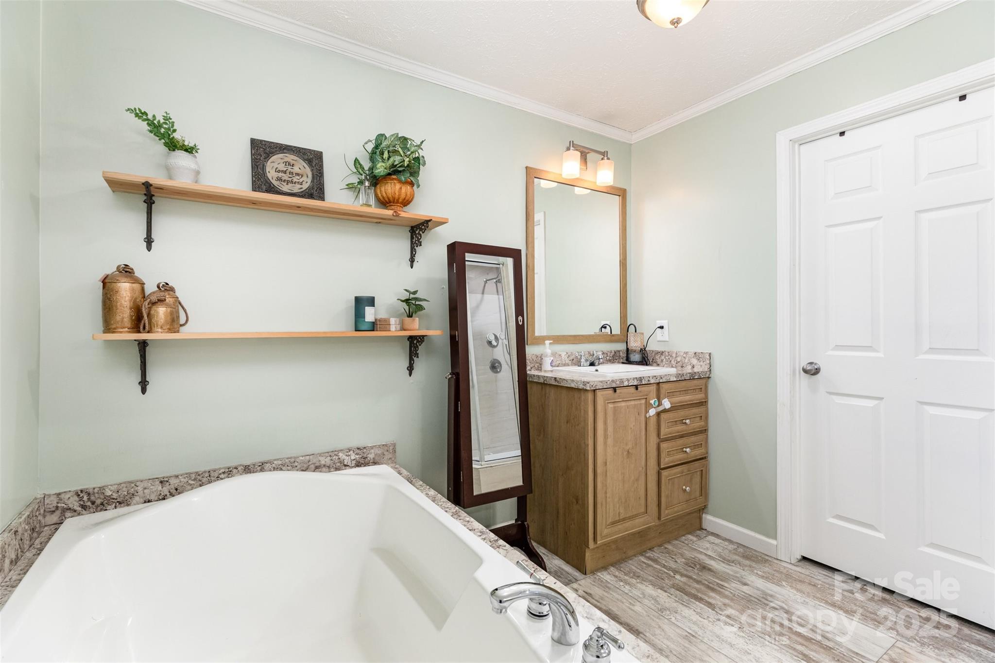 4110 Pebblebrook Circle Southwest Concord, NC 28027 - Photo 21 of 39 a room with a bed and cabinets