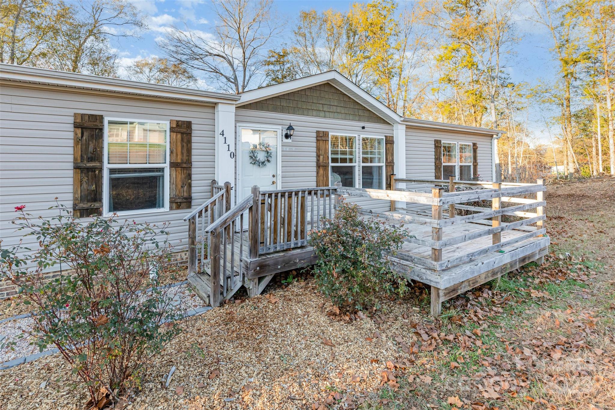 4110 Pebblebrook Circle Southwest Concord, NC 28027 - Photo 3 of 39 a view of a house with backyard and sitting area