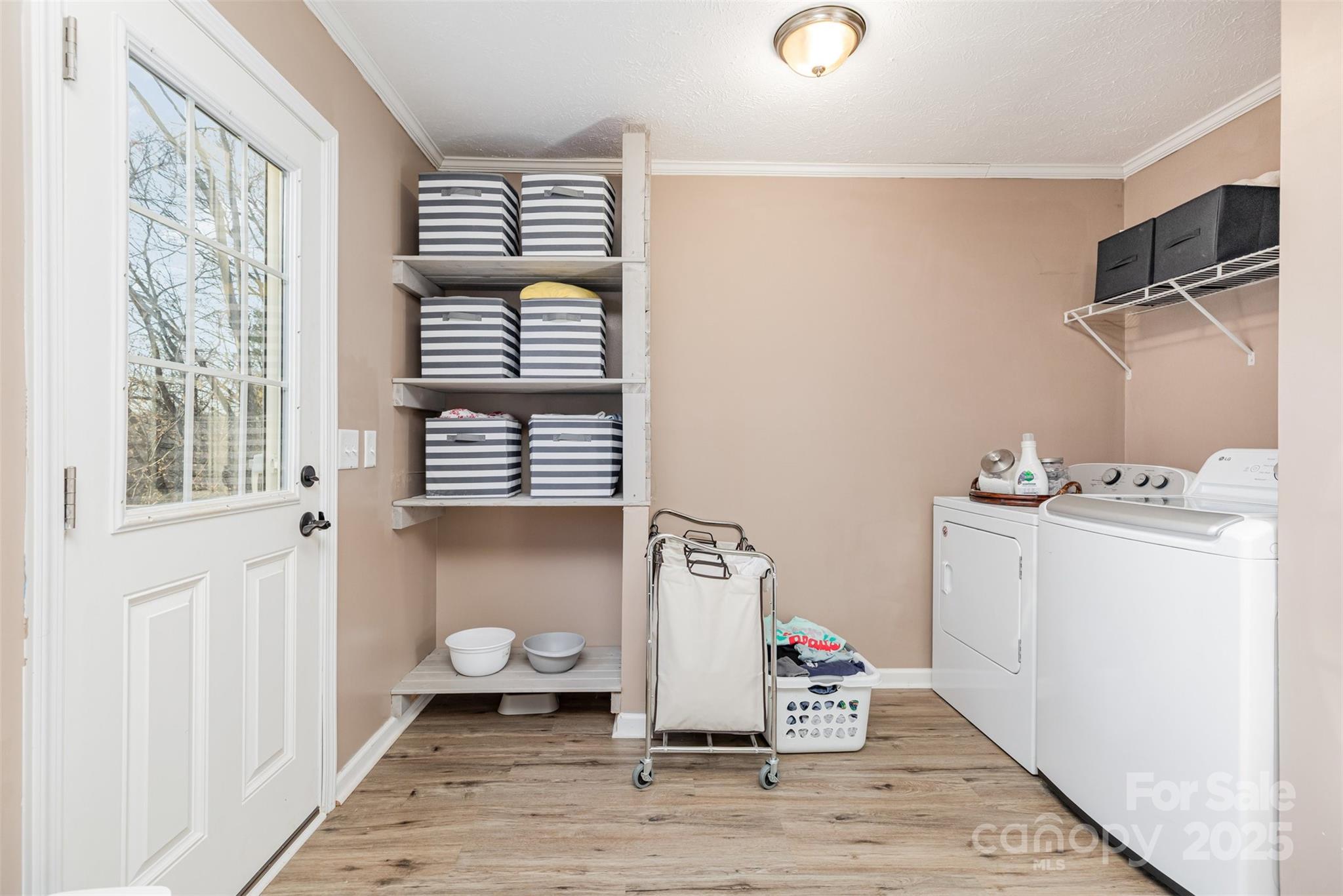 4110 Pebblebrook Circle Southwest Concord, NC 28027 - Photo 31 of 39 a view of entryway with workspace and wooden floor
