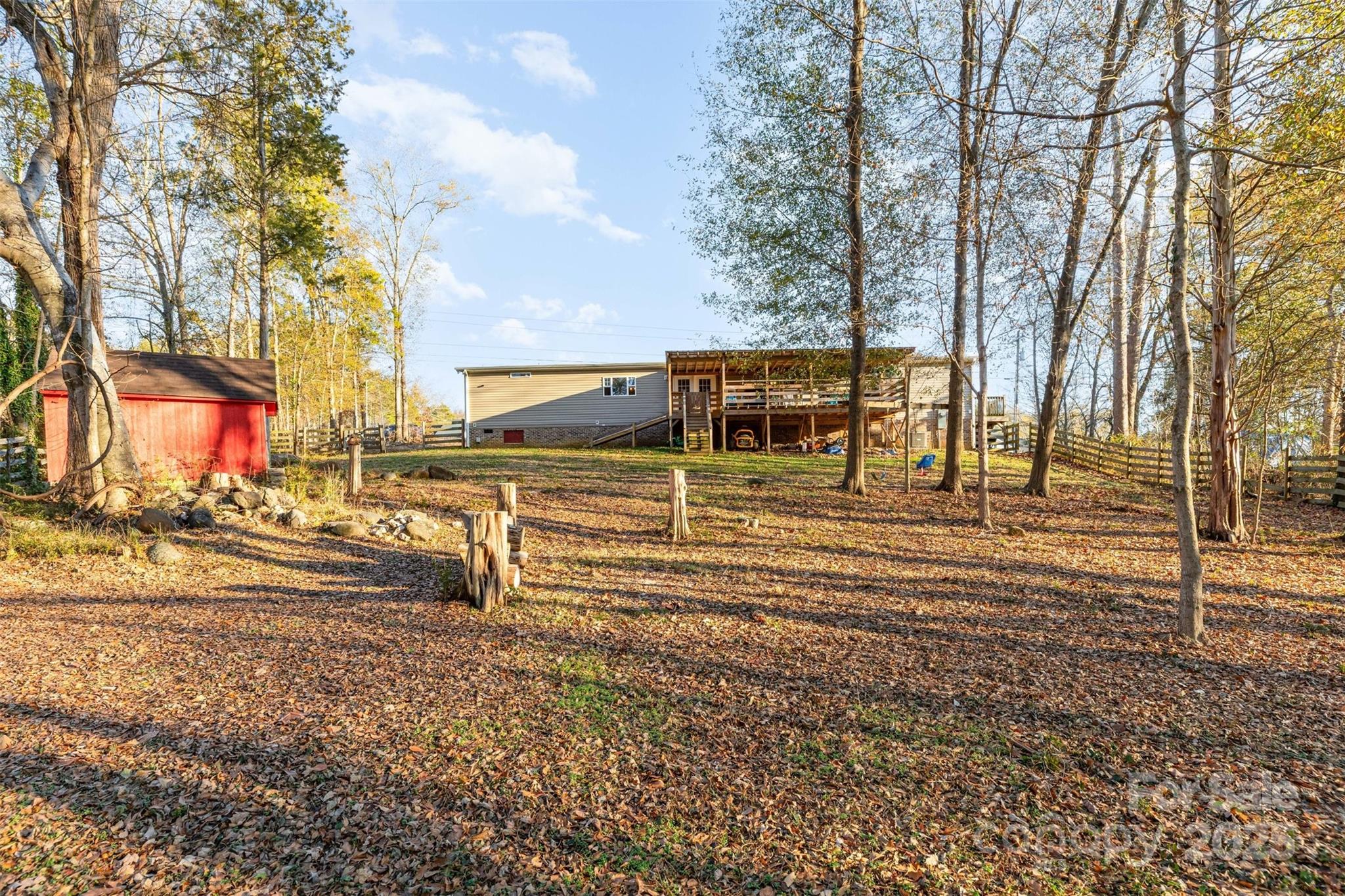 4110 Pebblebrook Circle Southwest Concord, NC 28027 - Photo 33 of 39 a view of a swimming pool with an outdoor seating