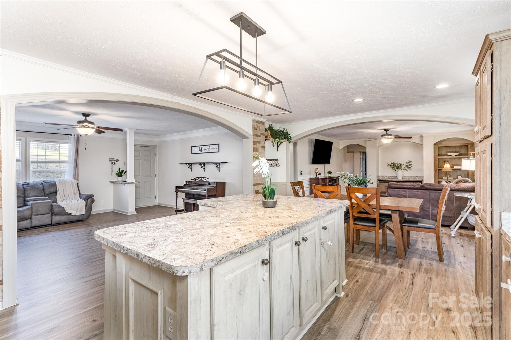 4110 Pebblebrook Circle Southwest Concord, NC 28027 - Photo 8 of 39 a large kitchen with a table and chairs