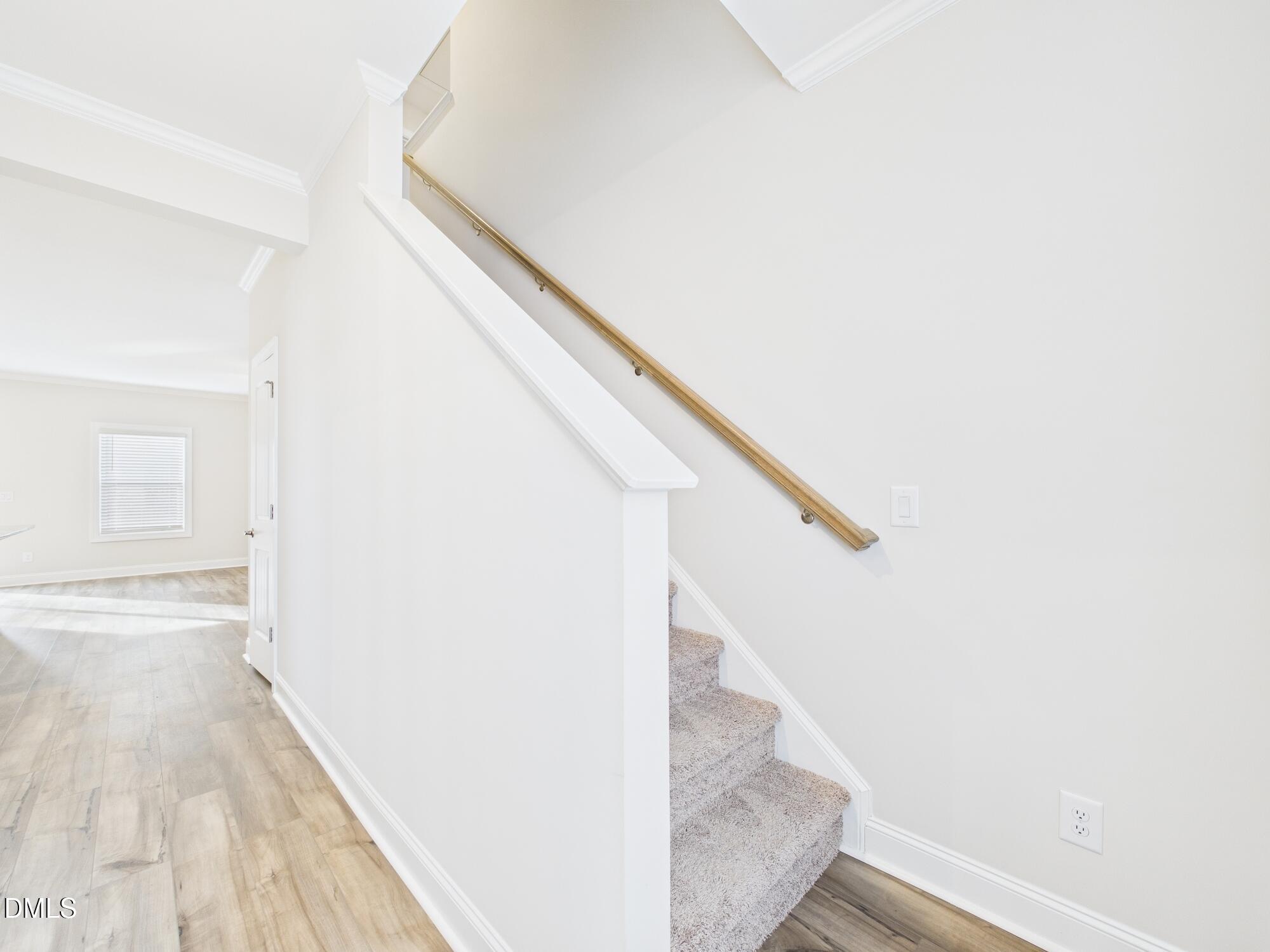 110 Symmetry Loop Youngsville, NC 27596 - Photo 11 of 72 a view of entryway with wooden floor