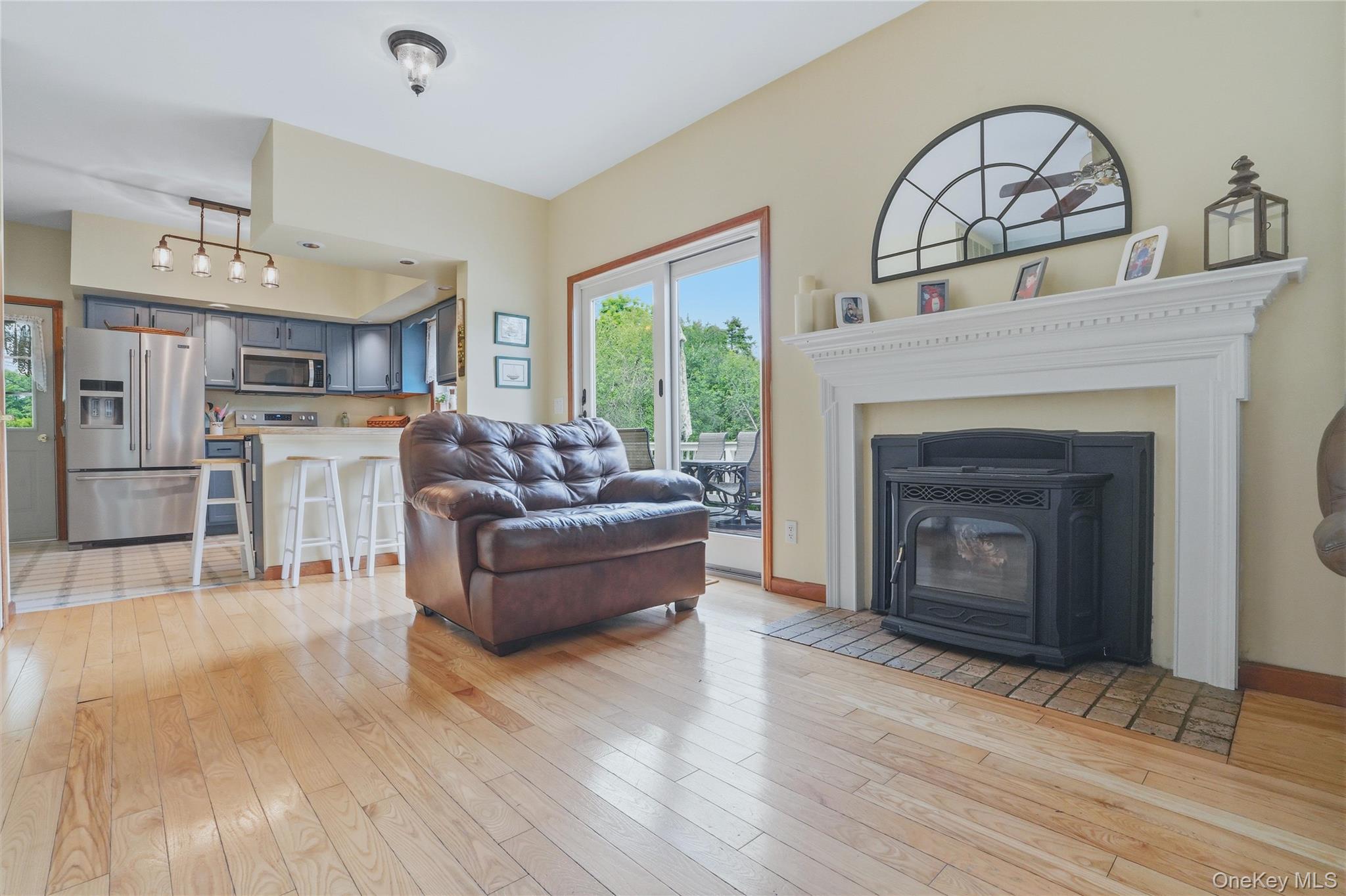 226 Cart Road, Unit C Dover Plains, NY 12522 - Photo 20 of 47 Living room with fireplace and wood floors