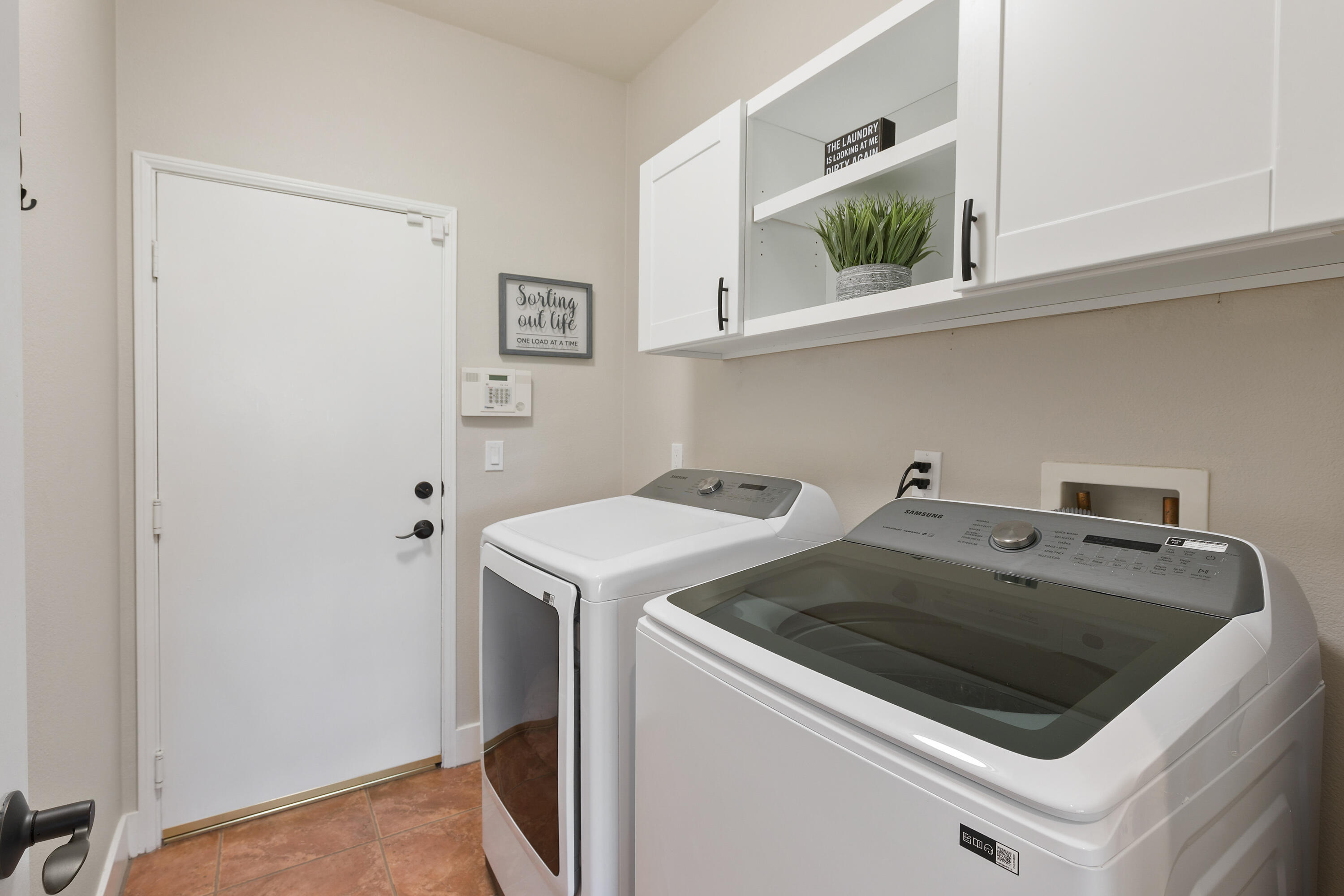 49377 Biery Street Indio, CA 92201 - Photo 20 of 32 a utility room with dryer and washer