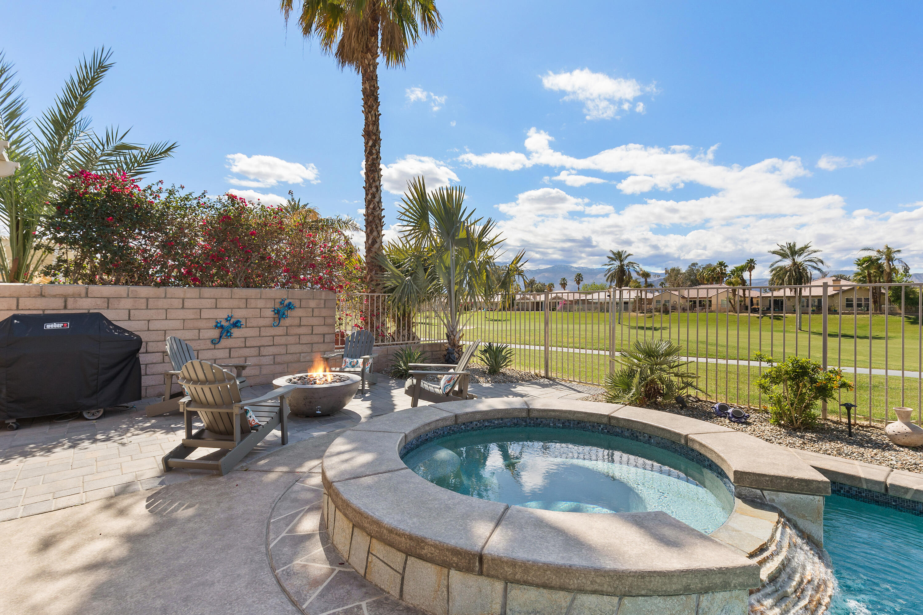 49377 Biery Street Indio, CA 92201 - Photo 25 of 32 a view of a swimming pool and lounge chair