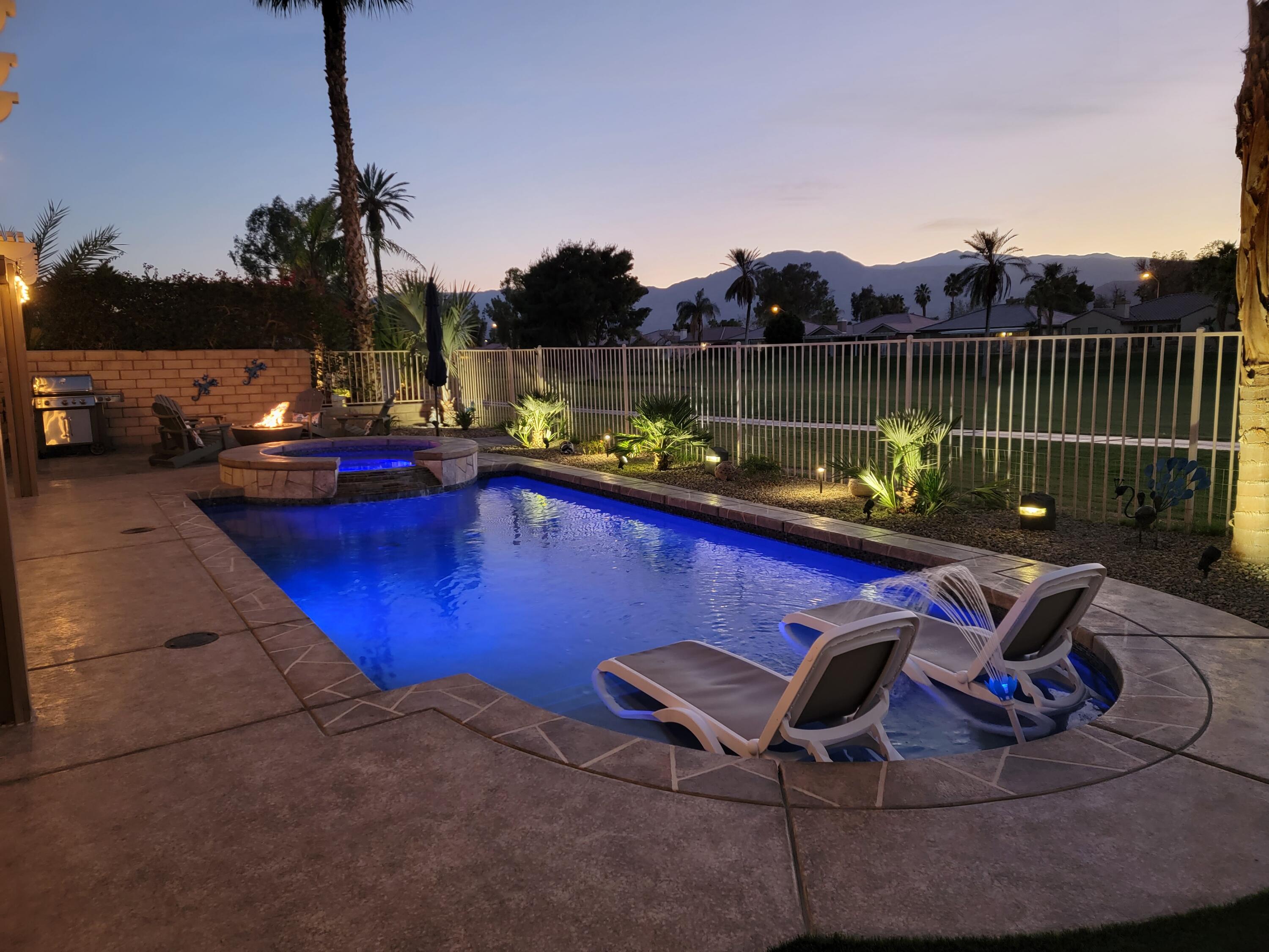 49377 Biery Street Indio, CA 92201 - Photo 26 of 32 a view of a swimming pool with a patio