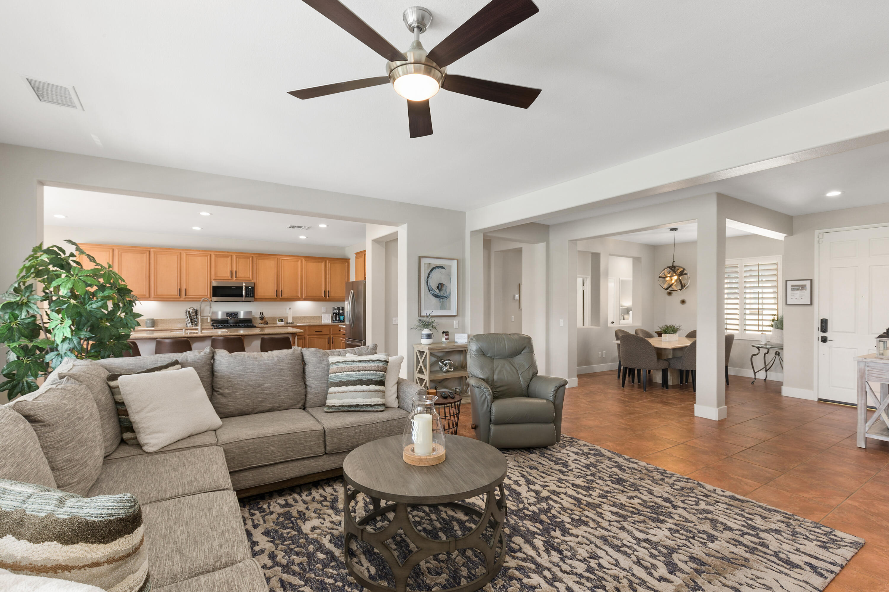 49377 Biery Street Indio, CA 92201 - Photo 6 of 32 a living room with furniture and a view of kitchen
