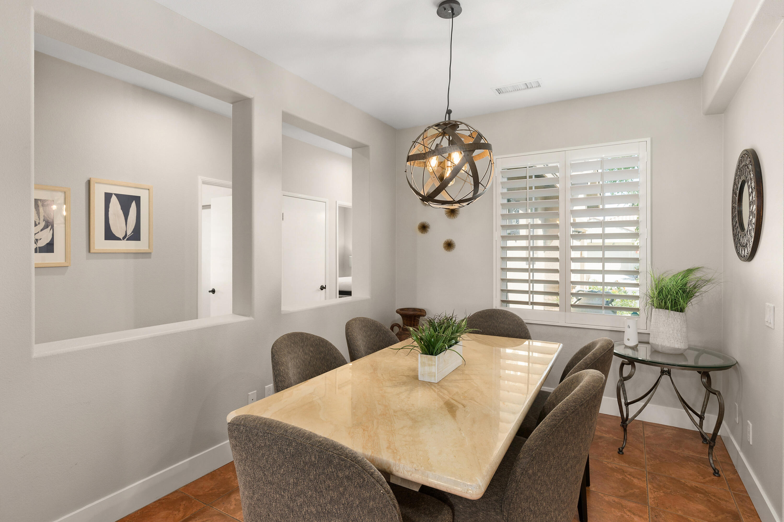 49377 Biery Street Indio, CA 92201 - Photo 7 of 32 a view of a dining room with furniture window and wooden floor