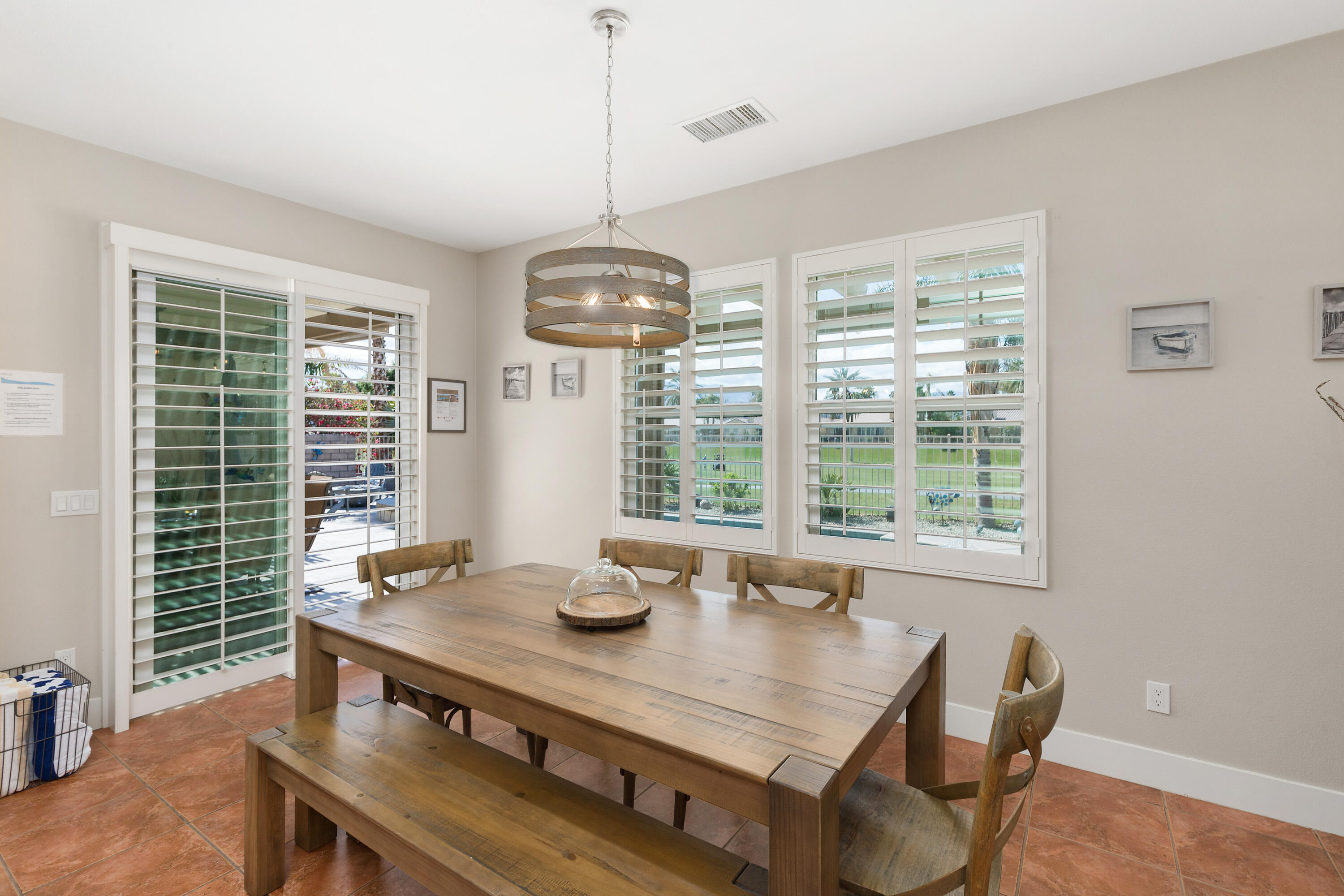 49377 Biery Street Indio, CA 92201 - Photo 10 of 32 a view of a dining room with furniture window and outside view