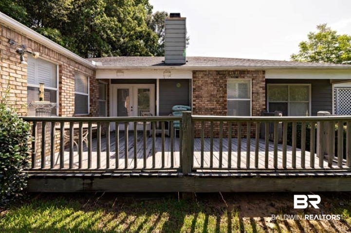 12 Stonebridge Court Mobile, AL 36608 - Photo 2 of 38 Wooden terrace with french doors