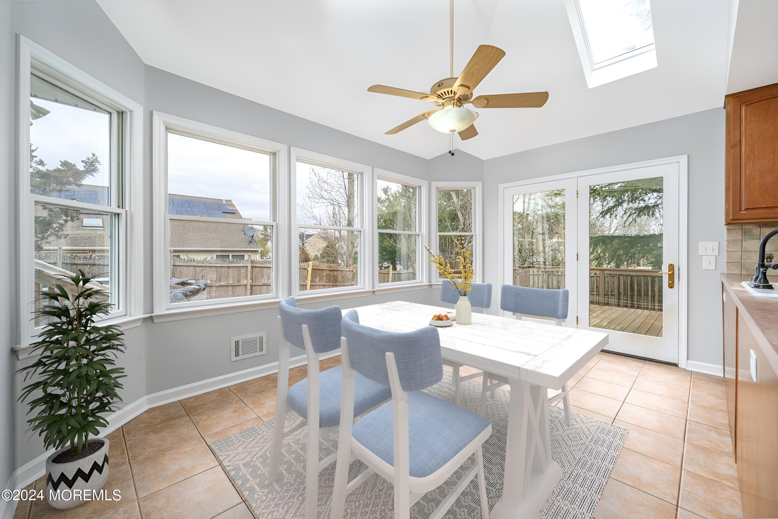 120 Leeward Road Manahawkin, NJ 08050 - Photo 11 of 23 a living room with furniture and a large window