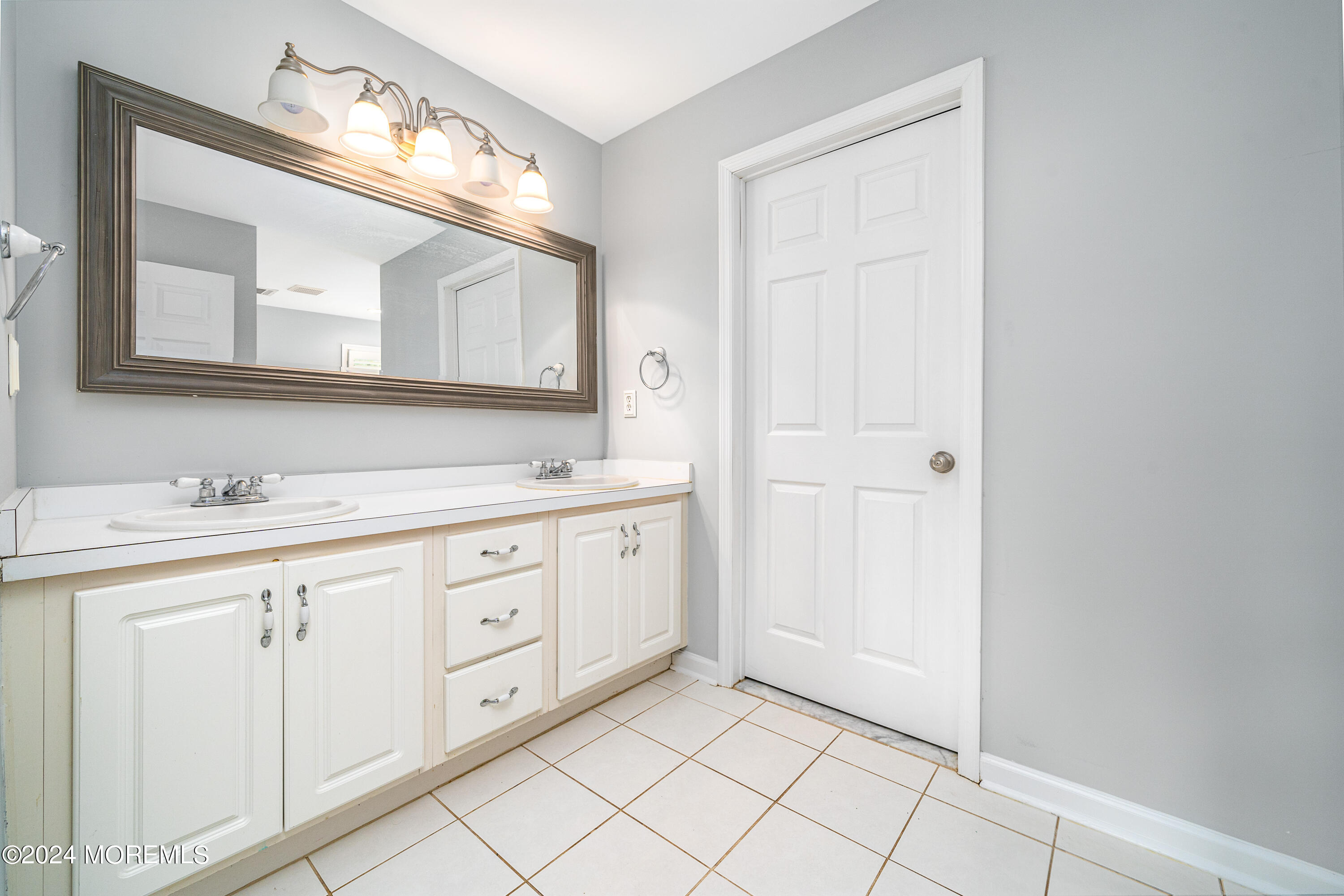 120 Leeward Road Manahawkin, NJ 08050 - Photo 17 of 23 a spacious bathroom with a double vanity sink mirror and