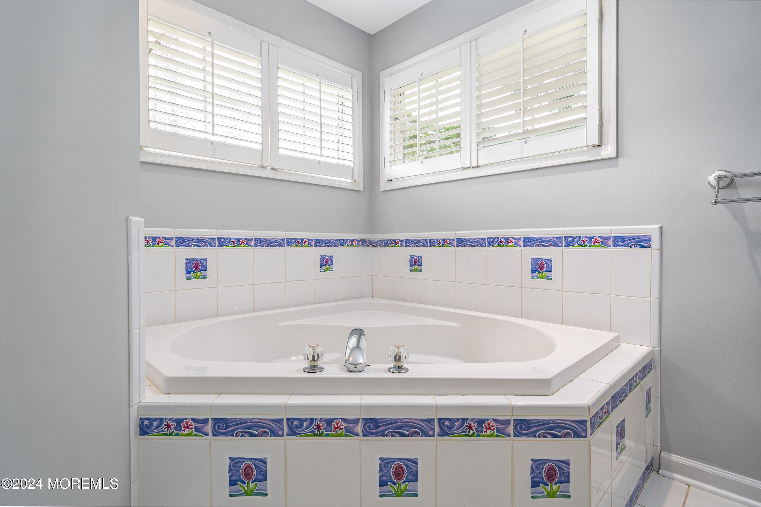 120 Leeward Road Manahawkin, NJ 08050 - Photo 18 of 23 a white bath tub sitting in a bathroom