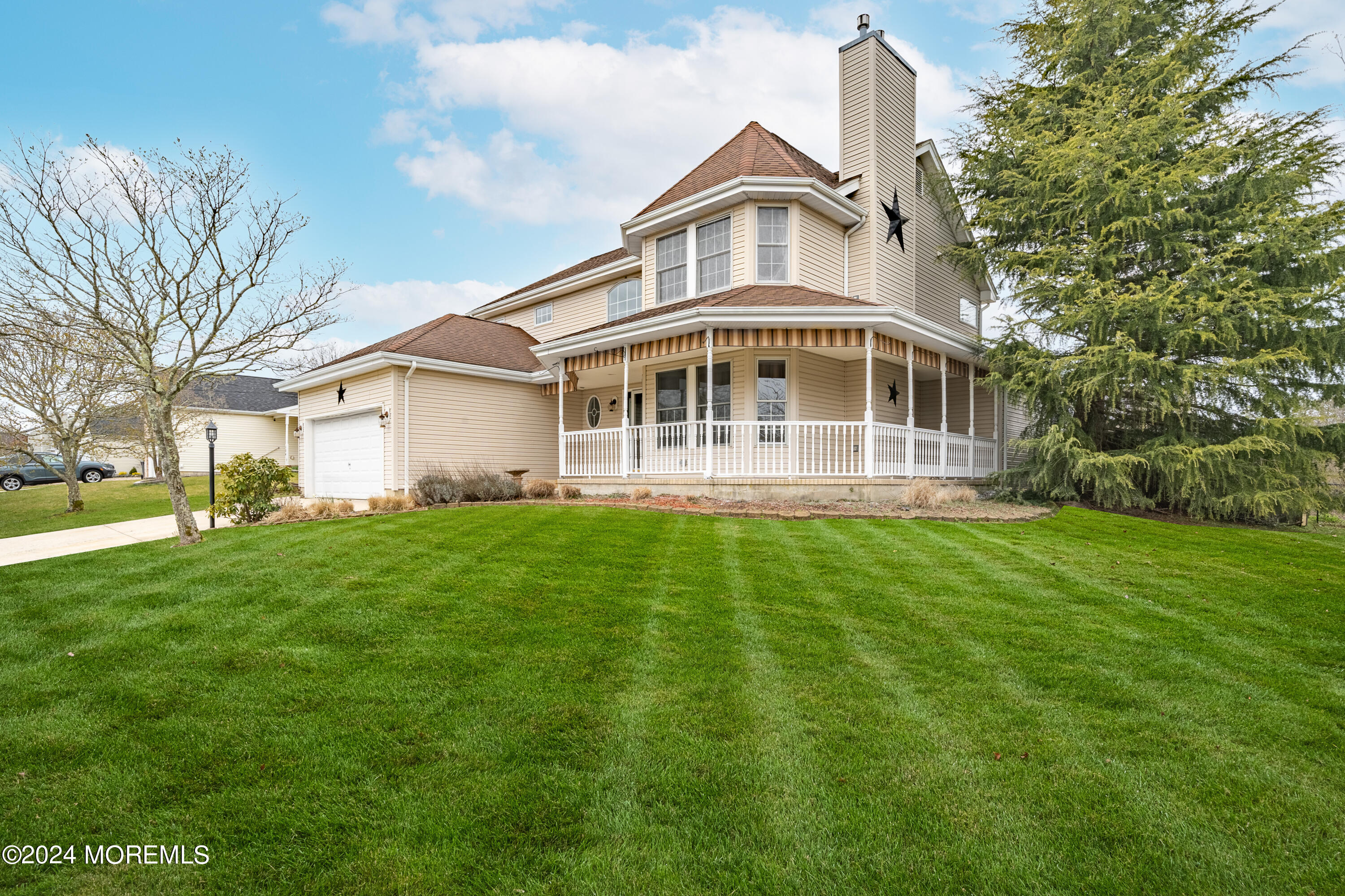 120 Leeward Road Manahawkin, NJ 08050 - Photo 2 of 23 a front view of a house with a yard