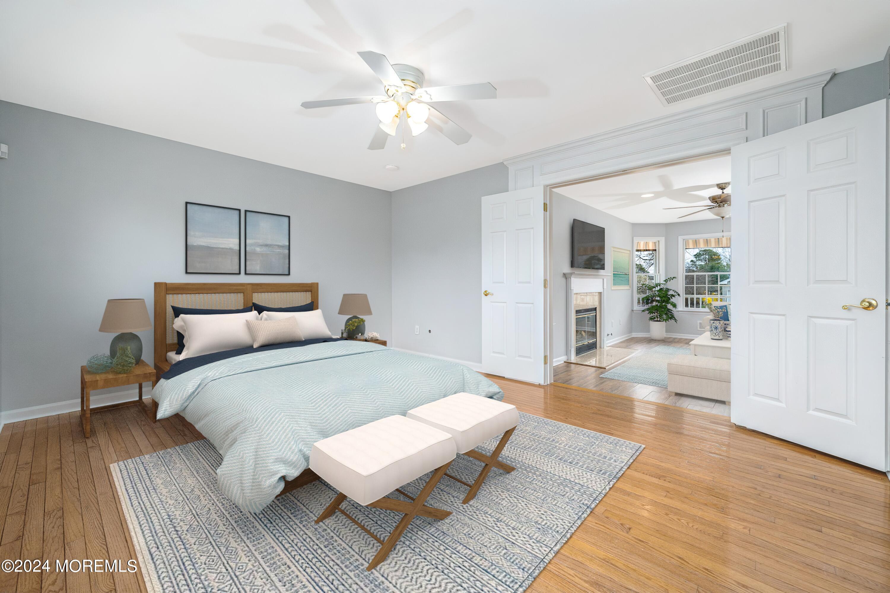 120 Leeward Road Manahawkin, NJ 08050 - Photo 6 of 23 a spacious bedroom with a bed a table and closet