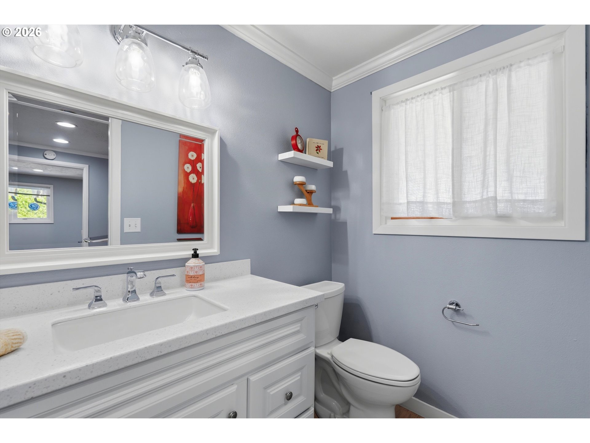 5095 Southeast Roethe Road Milwaukie, OR 97267 - Photo 17 of 28 a bathroom with a sink toilet and window