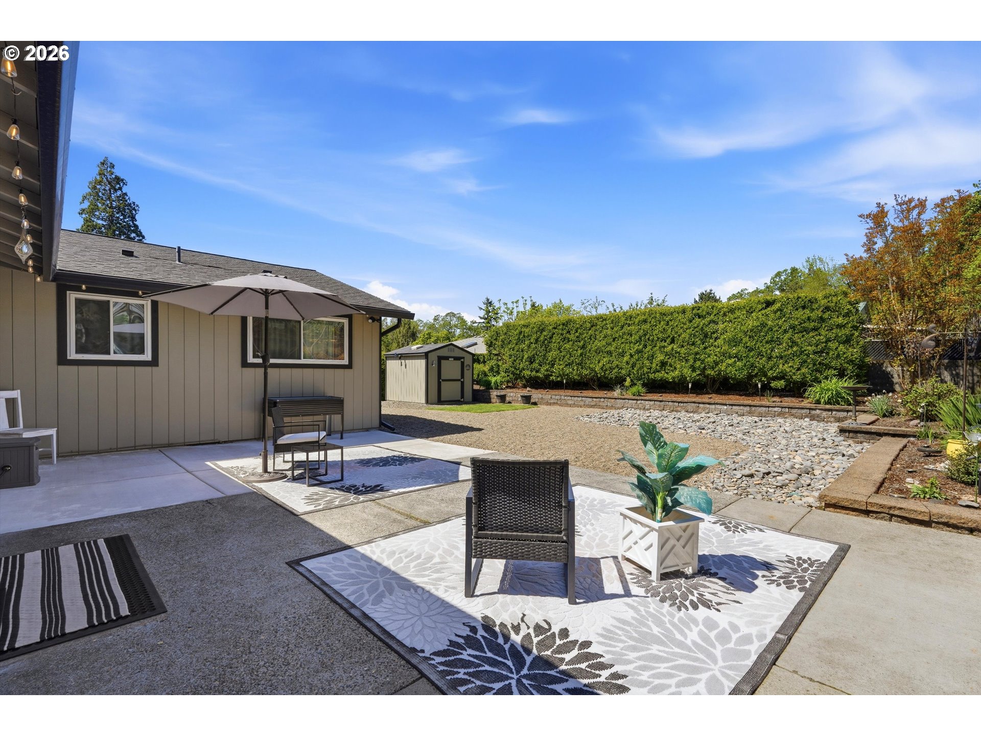 5095 Southeast Roethe Road Milwaukie, OR 97267 - Photo 21 of 28 a view of a backyard with sitting area