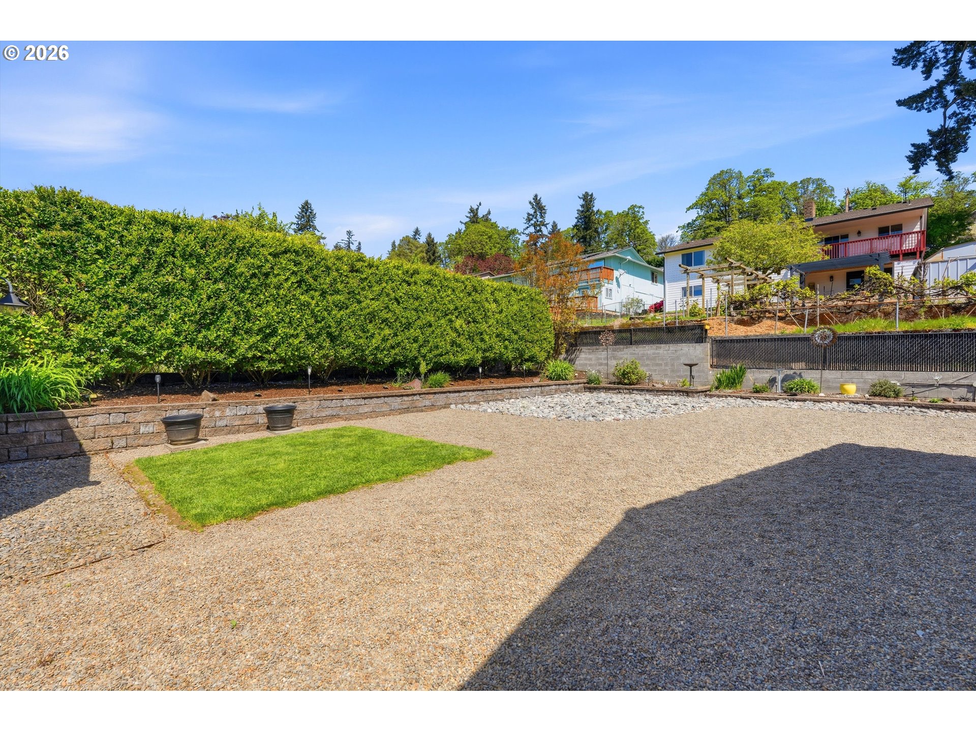 5095 Southeast Roethe Road Milwaukie, OR 97267 - Photo 28 of 28 a backyard of a house with lots of green space