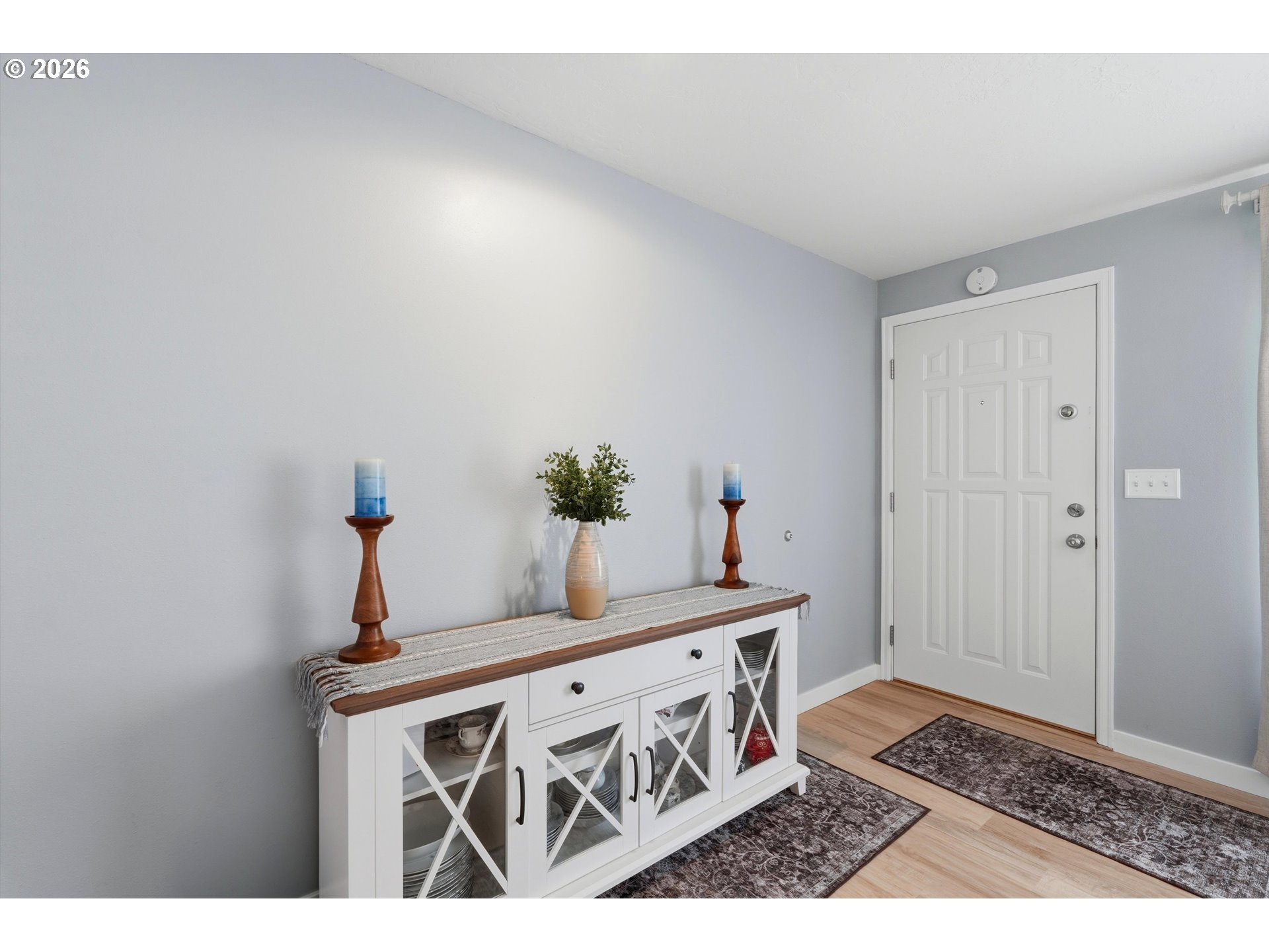 5095 Southeast Roethe Road Milwaukie, OR 97267 - Photo 4 of 28 a view of a room that has a table in it