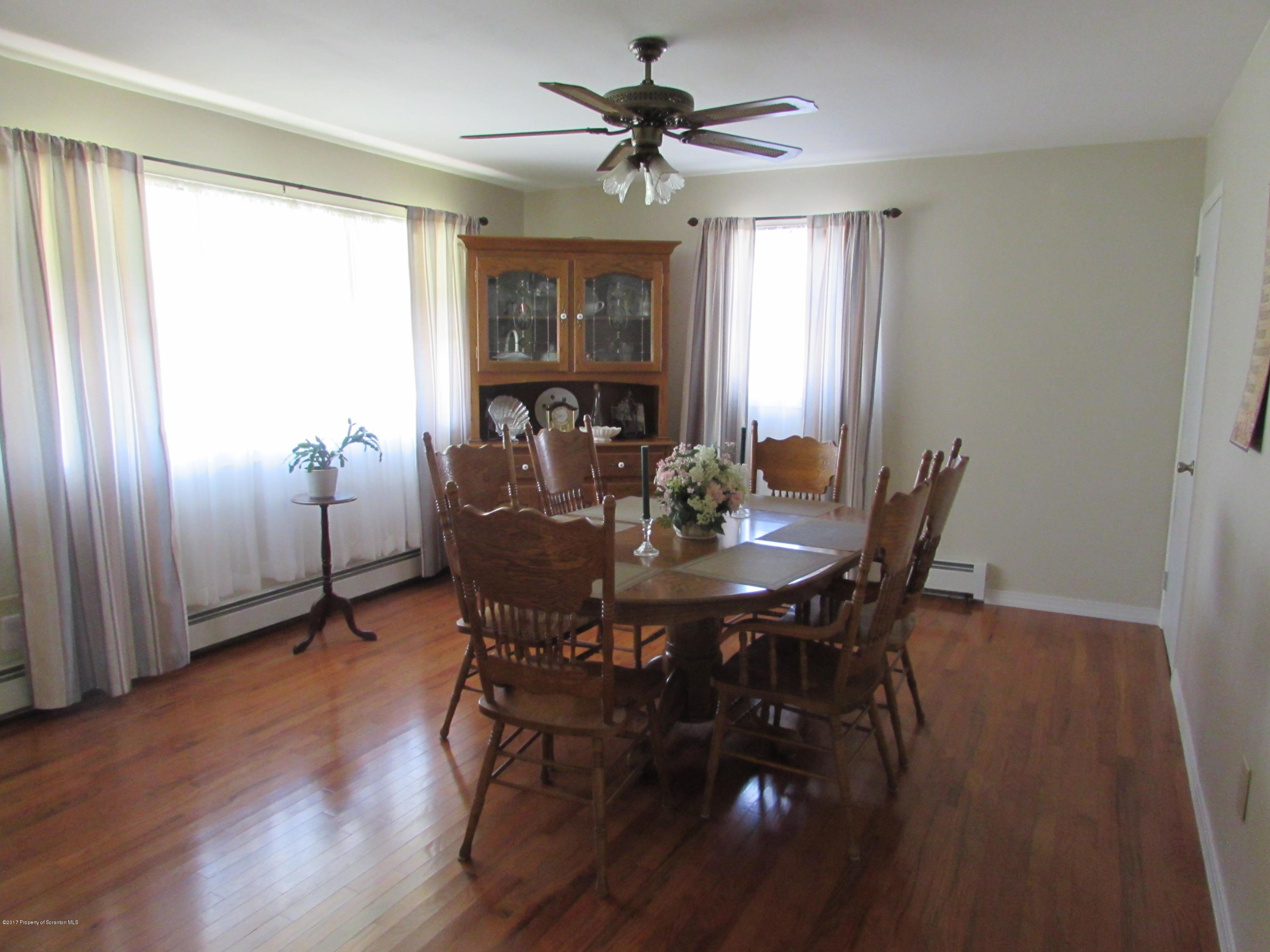 28 Ripplebrook Road Tunkhannock, PA 18657 - Photo 5 of 19 a view of a dining room with furniture window and wooden floor
