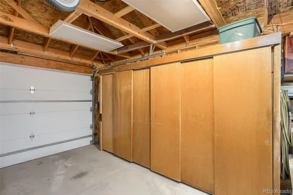 a view of a room with wooden walls