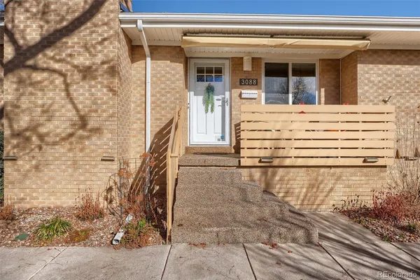 a view of a entryway door front of house
