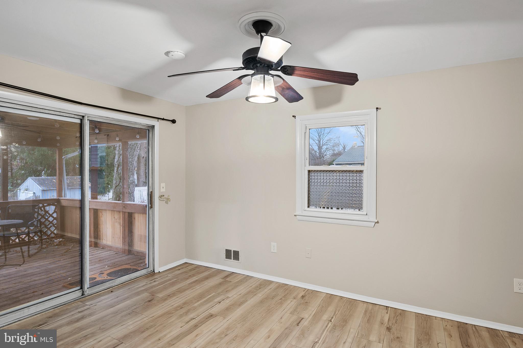 8084 Clark Station Road Severn, MD 21144 - Photo 12 of 36 a view of an empty room with a window