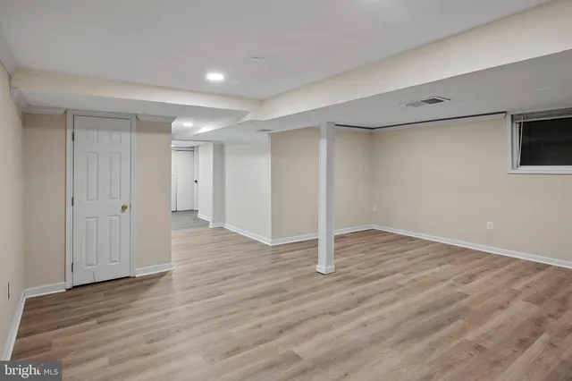 a picture of a bench in front of door