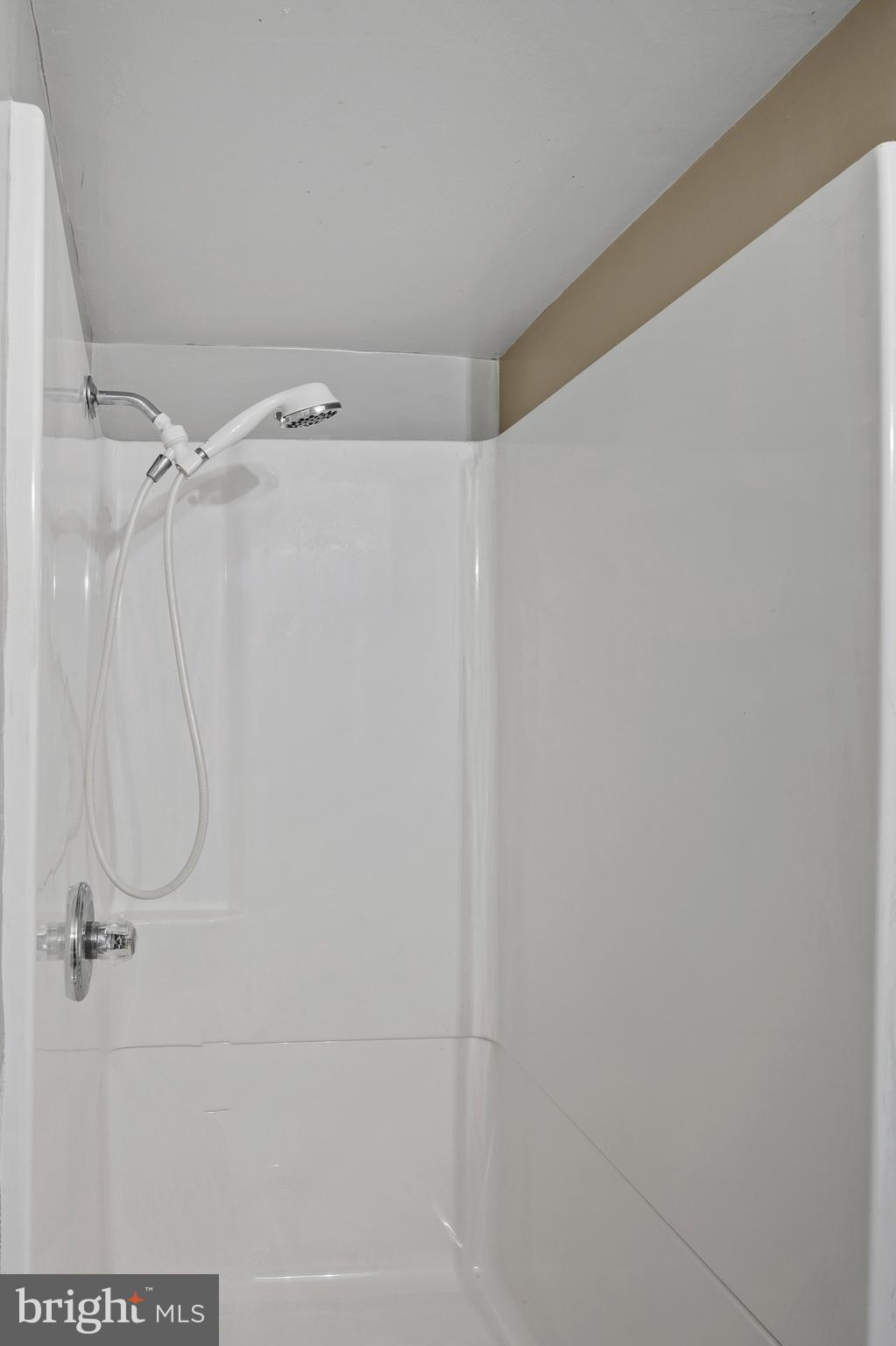 8084 Clark Station Road Severn, MD 21144 - Photo 21 of 36 a bathroom with a shower