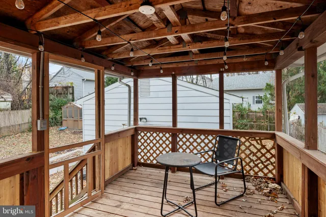 a view of washer and dryer with wooden floor
