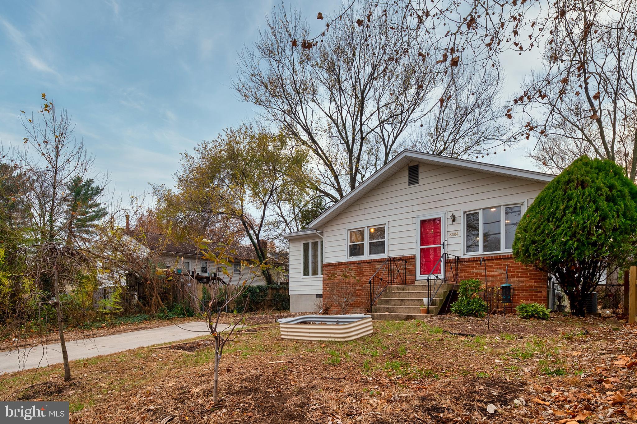 8084 Clark Station Road Severn, MD 21144 - Photo 3 of 36 a view of a house with a yard covered in snow