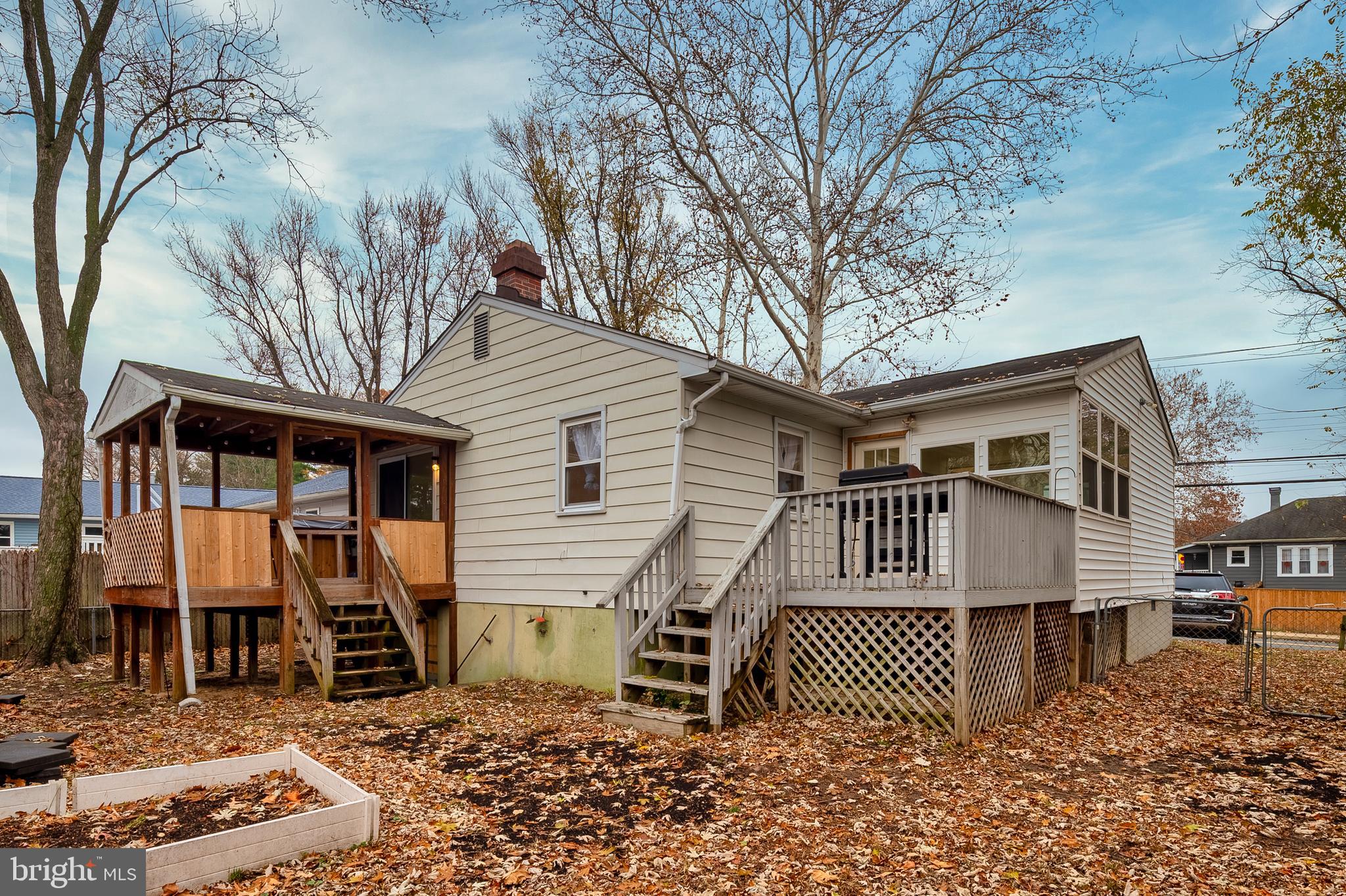 8084 Clark Station Road Severn, MD 21144 - Photo 32 of 36 a front view of a house with garden