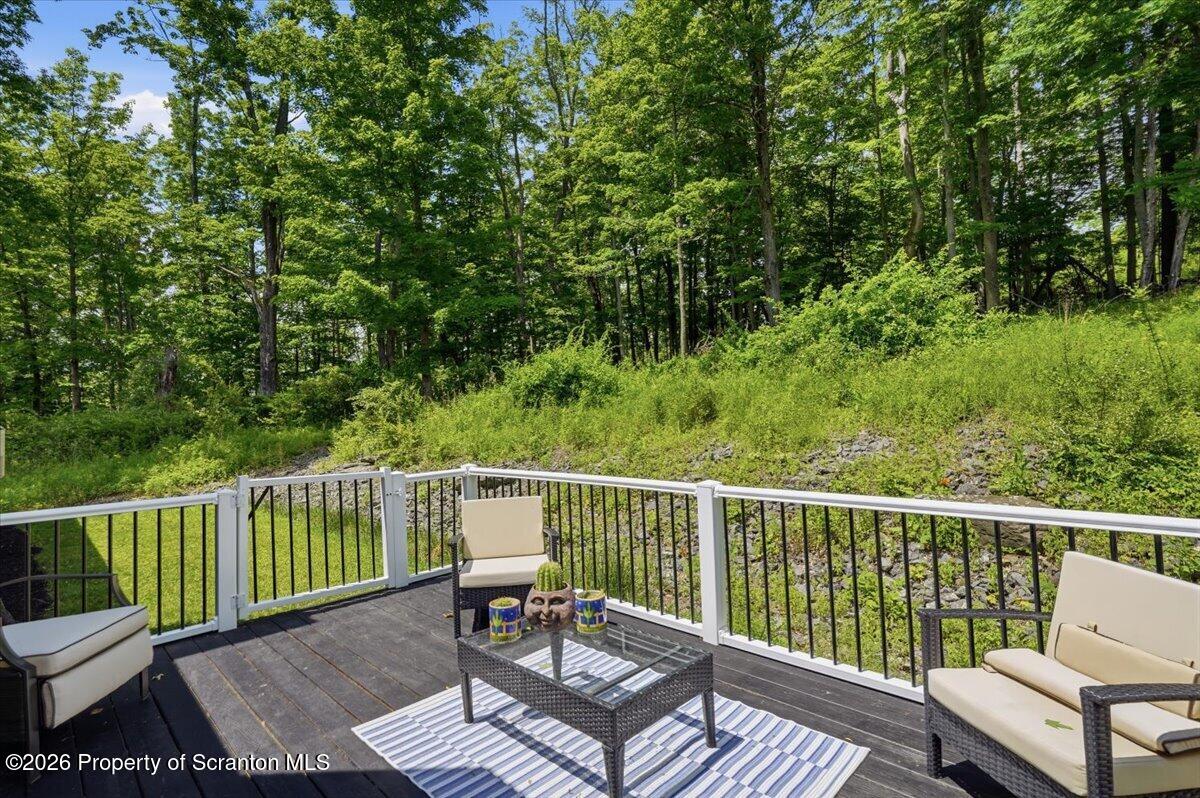 99 Hilltop Road Waverly, PA 18471 - Photo 39 of 41 a view of a two chairs in the deck