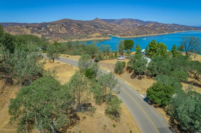 a view of a lake with mountains in the background