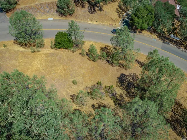 a view of a lake with a yard