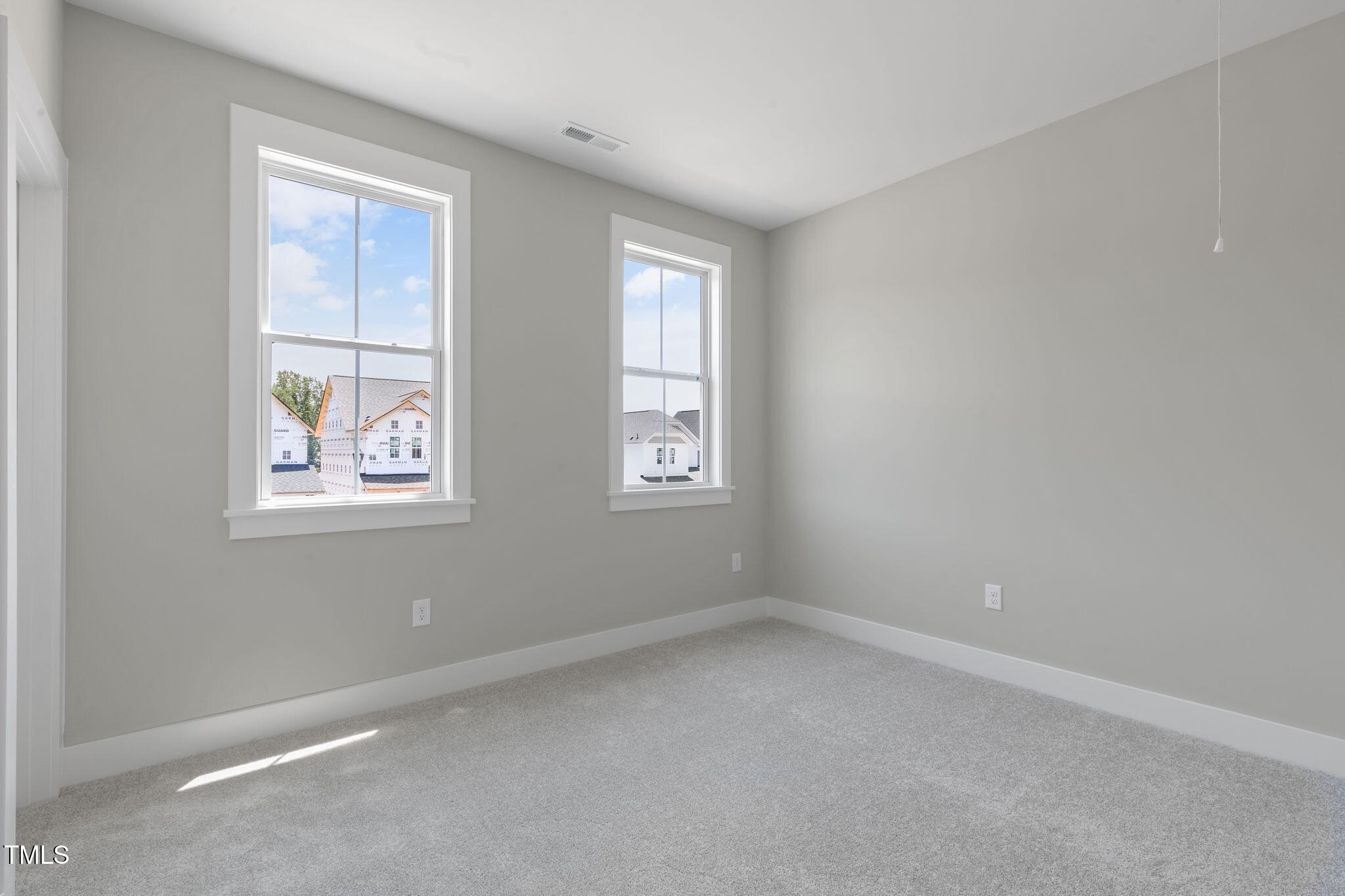 1556 Piney Fls Drive Wendell, NC 27591 - Photo 17 of 43 an empty room with windows