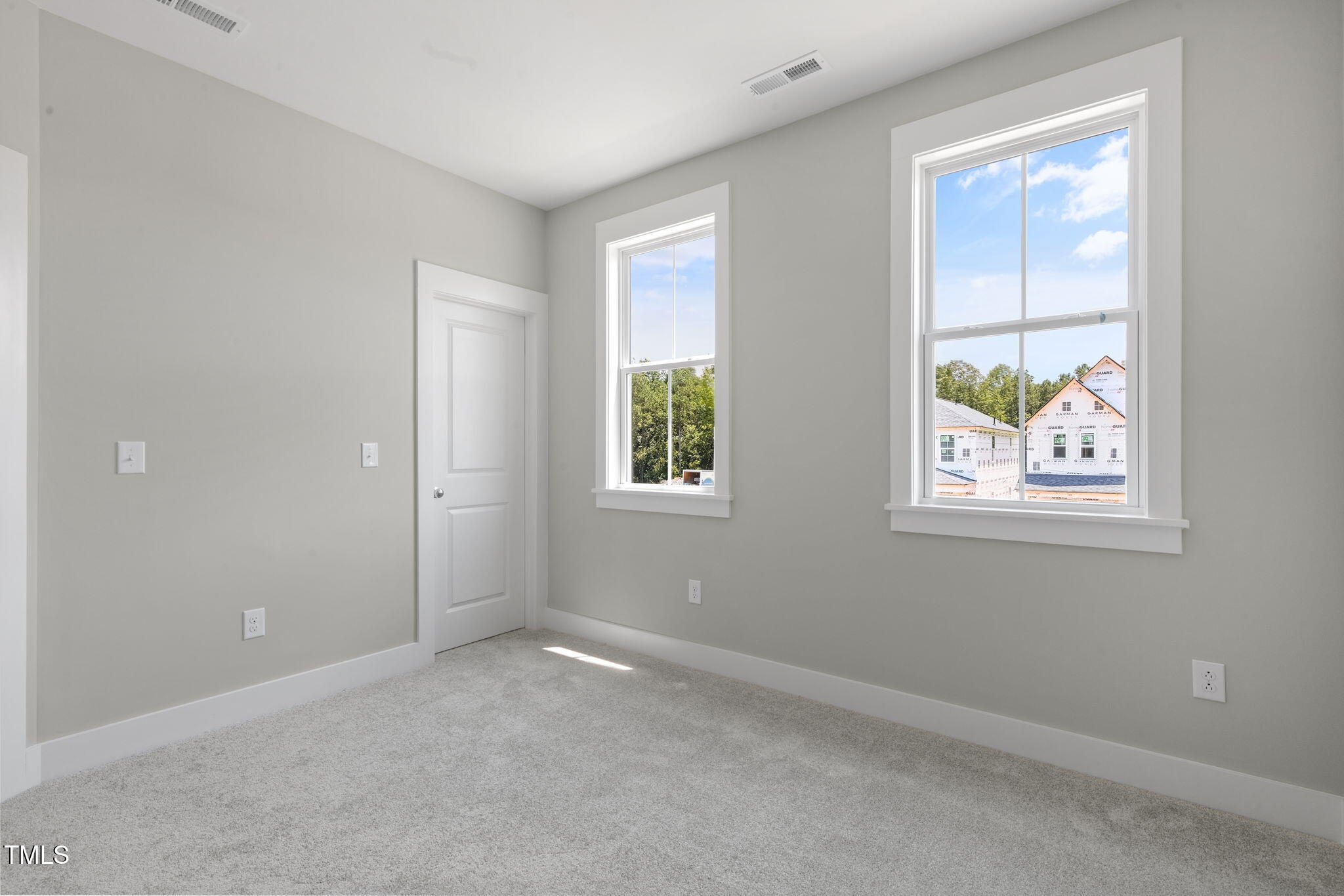 1556 Piney Fls Drive Wendell, NC 27591 - Photo 18 of 43 an empty room with windows