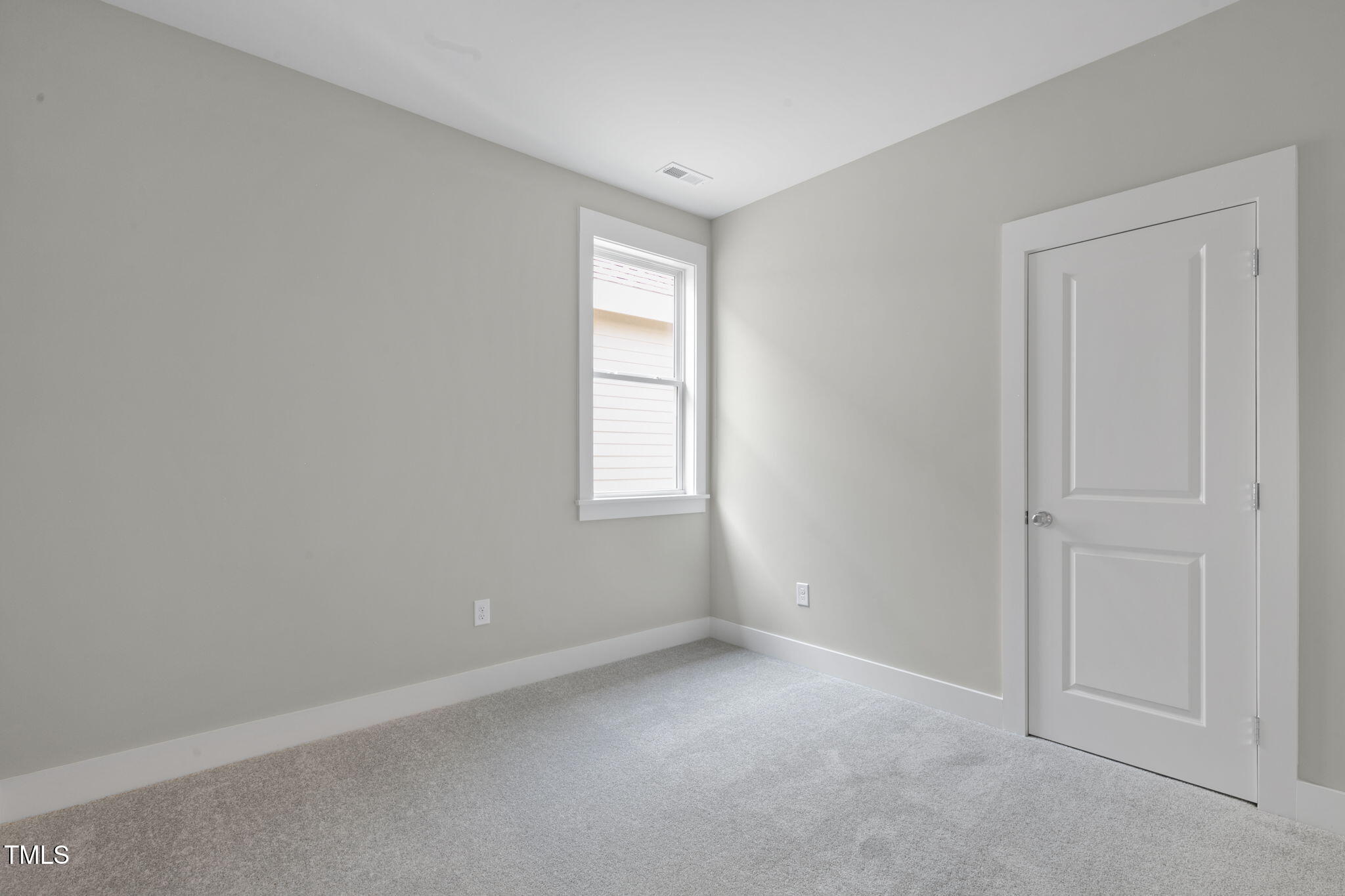 1556 Piney Fls Drive Wendell, NC 27591 - Photo 20 of 43 an empty room with windows