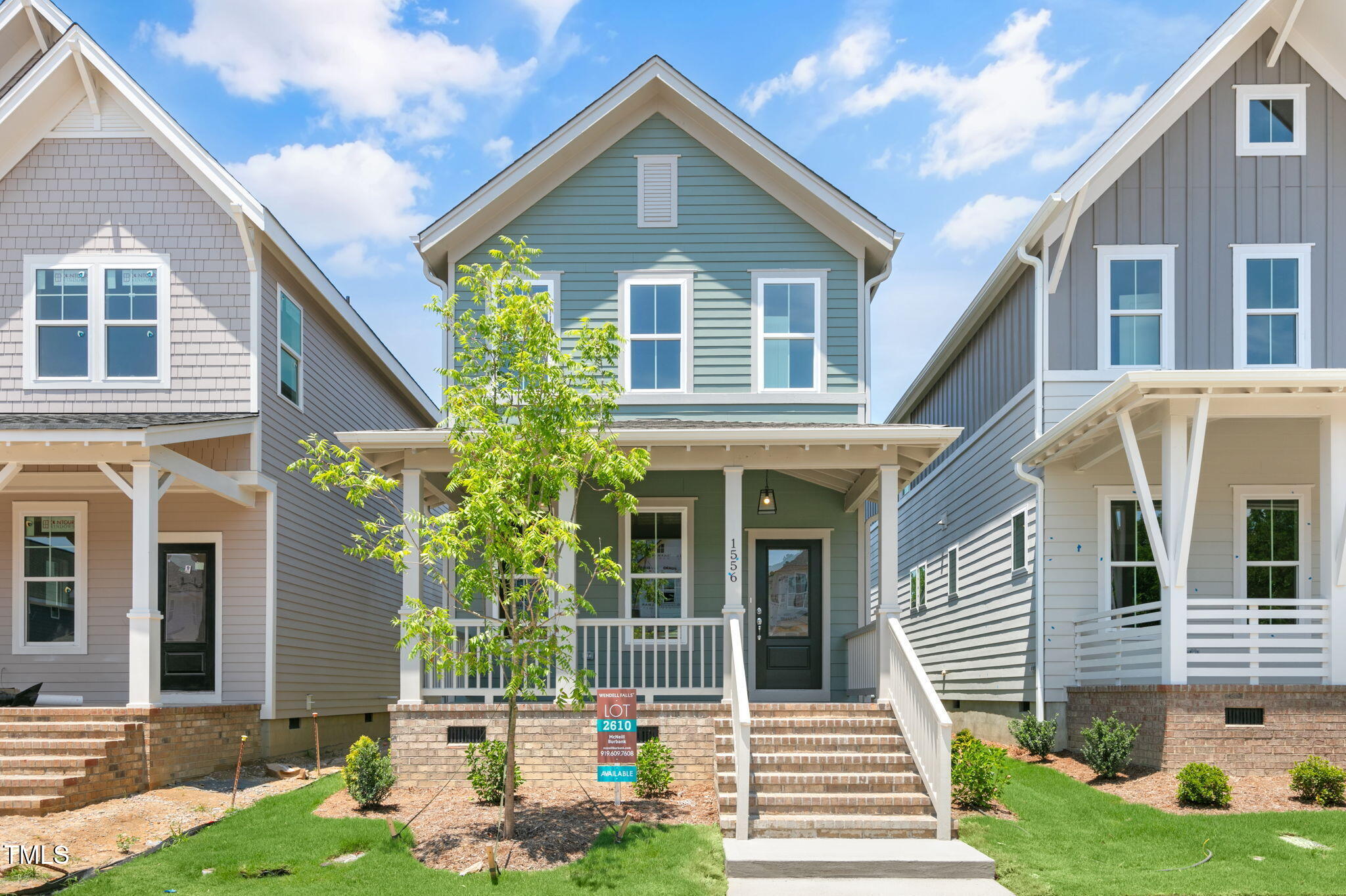 1556 Piney Fls Drive Wendell, NC 27591 - Photo 2 of 43 a front view of a house with garden