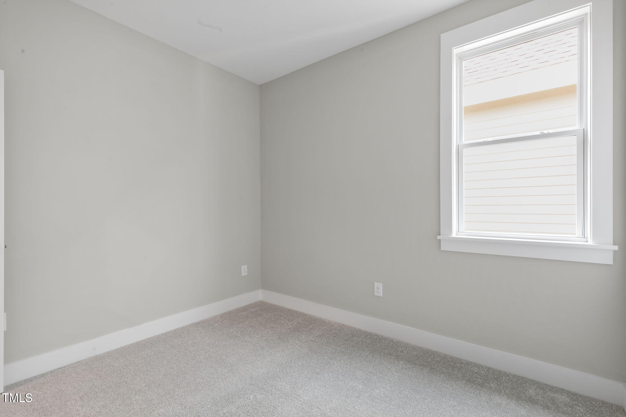 1556 Piney Fls Drive Wendell, NC 27591 - Photo 22 of 43 an empty room with a window