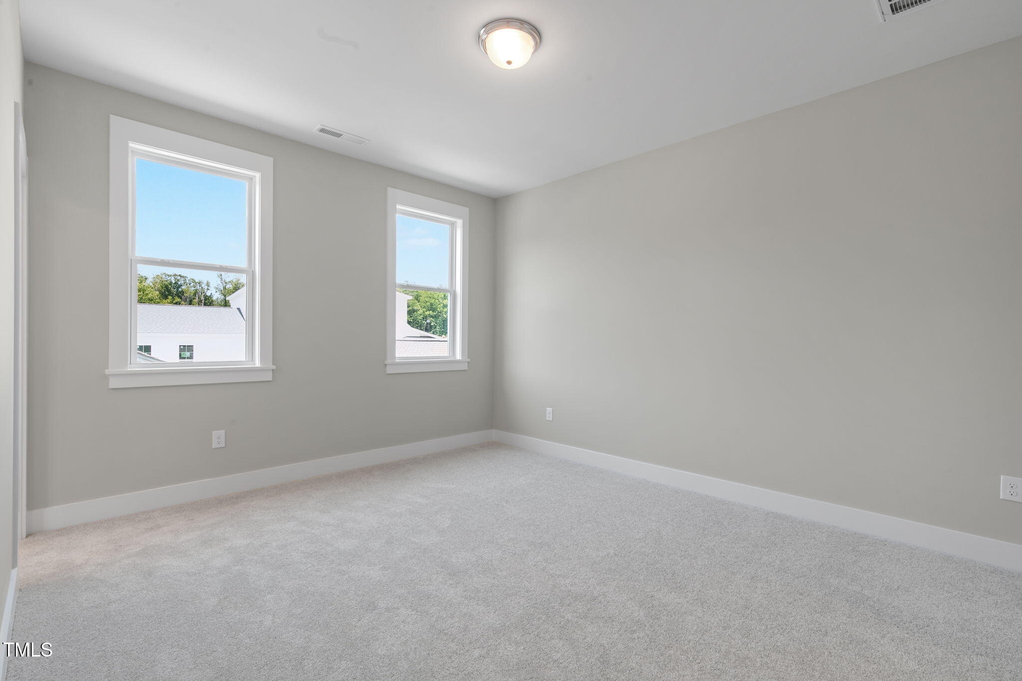 1556 Piney Fls Drive Wendell, NC 27591 - Photo 25 of 43 an empty room with windows